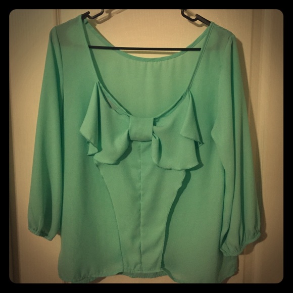 Mint bow back shirt.