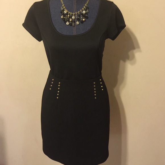 Black studded mini skirt by H&M. NWT