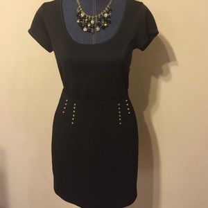 Black studded mini skirt by H&M. NWT