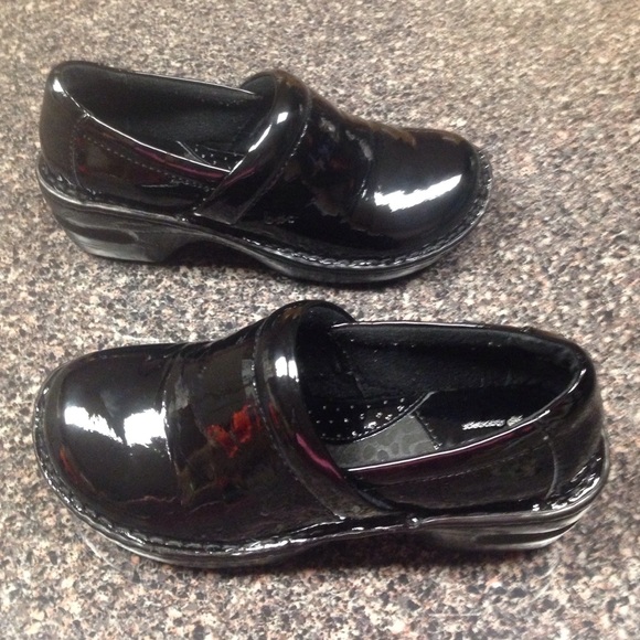 shiny black clogs