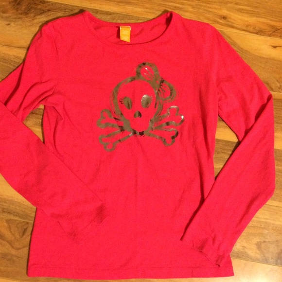 Bright pink long sleeve skull with bow.