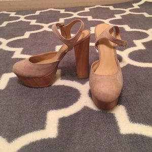 Tan and wooden platform heels