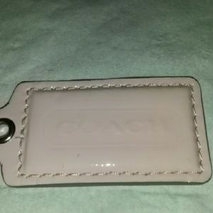 Coack pink patent tag