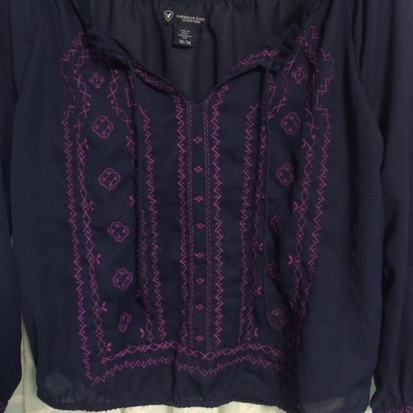 American Eagle Navy blue top with purple design.