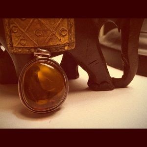 Vintage AMBER with Sterling silver trim.