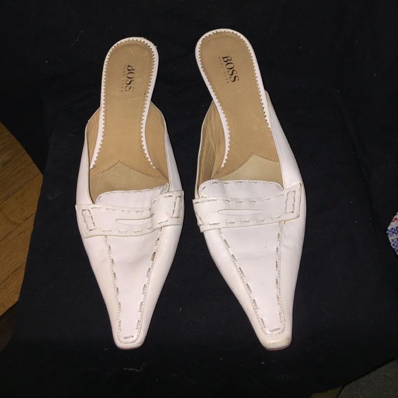 Hugo Boss White Leather closed toe slip on's.