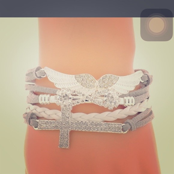 Multi bling bracelet silver Blinged wings cross