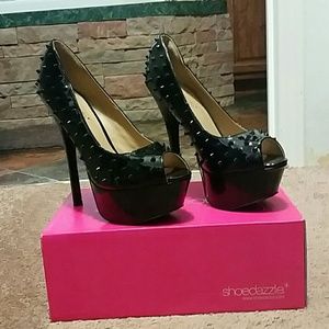 Spiked black heels