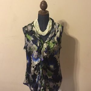 Dark floral print sleeveless blouse by Sunny Leigh