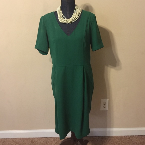 Emerald green with gold zipper back