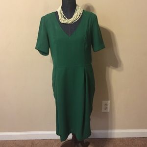 Emerald green with gold zipper back