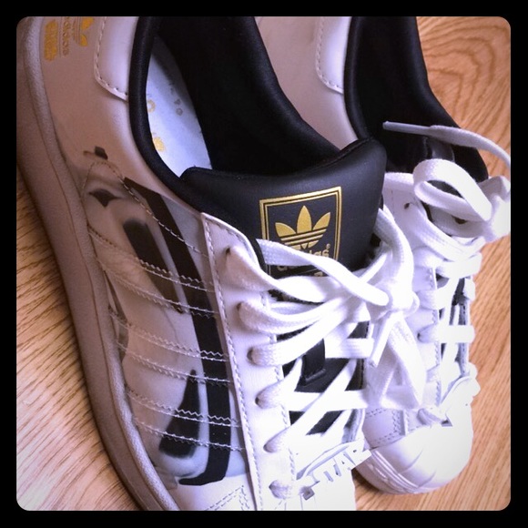 Adidas superstars big kids size 4.