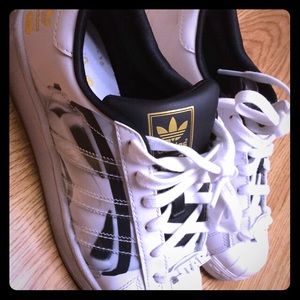 Adidas superstars big kids size 4.