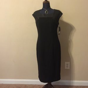 Black dress with faux leather trim neckline