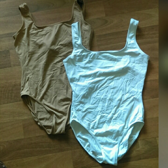 White and nude leotards