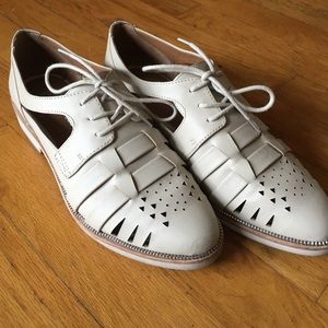 Cream cut out loafers zipper trim