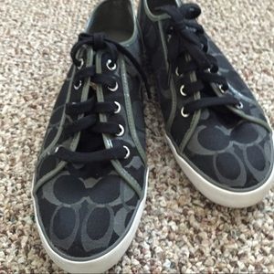 Coach black tennis shoes.