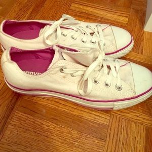 White with pink line converse