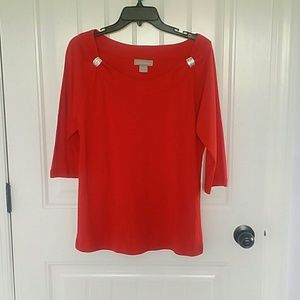 Women's top with embellishments. Size large.