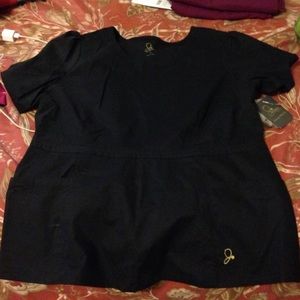 Jaanuu peplum style scrub top!