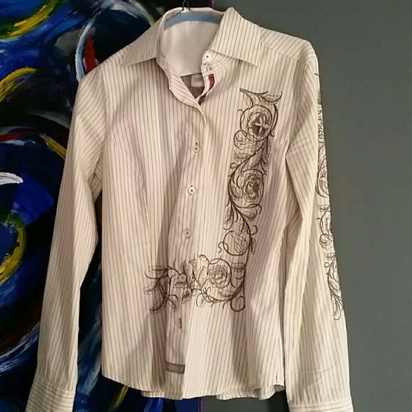 Striped button down shirt.