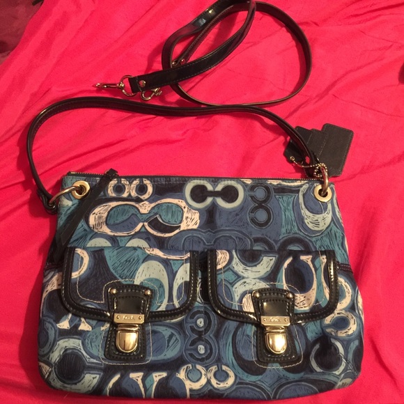 Slightly used blue coach purse