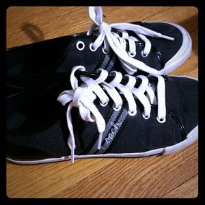 Black and white Coach shoes