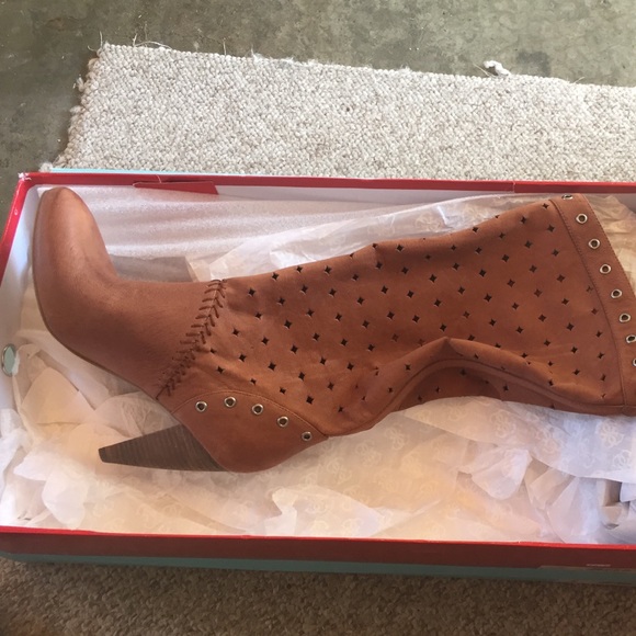 Brand new - never been worn, brown GUESS boots.