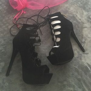 Plush black platform heels