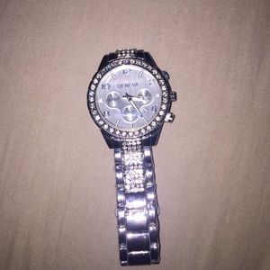 Women's silver Geneva watch
