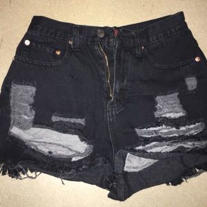 Black torn denim shorts