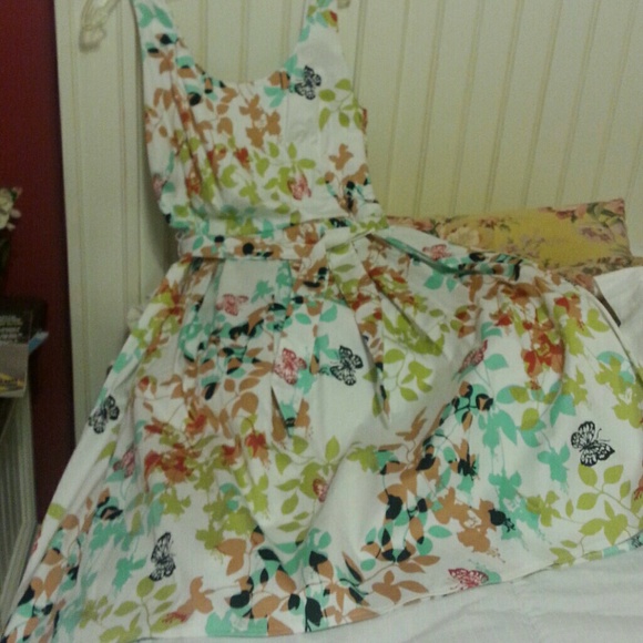 Sun dress, cotton.  Machine washable,  self belt