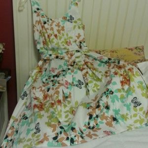 Sun dress, cotton.  Machine washable,  self belt