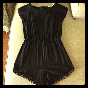 Black romper that ties in the back.