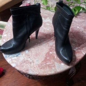 Boots gently used slight scuffs on heel.