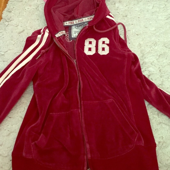 A Burgundy hooded zip up from pink