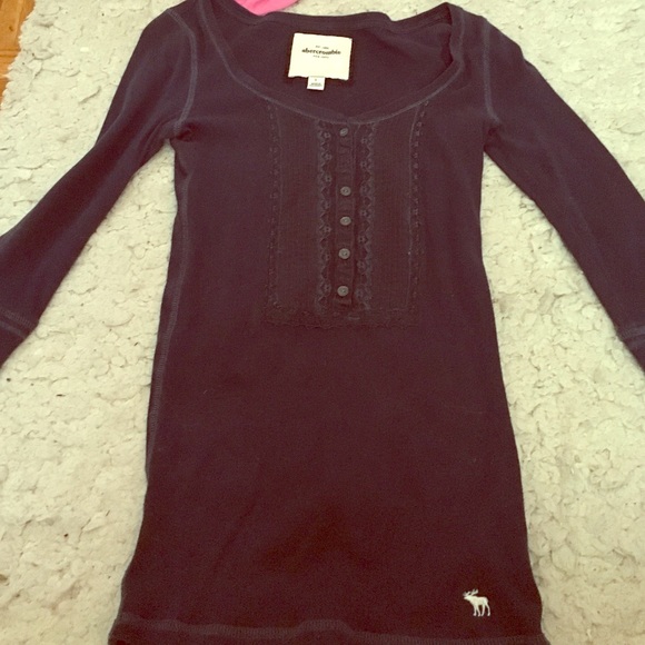 A dark blue casual, and cute shirt