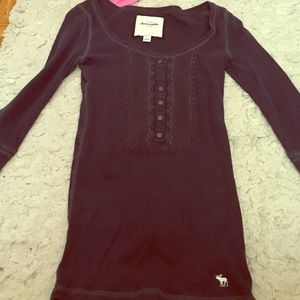 A dark blue casual, and cute shirt