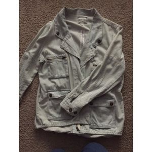 stripped jean and white jacket.