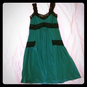 Soft green dress with black lace