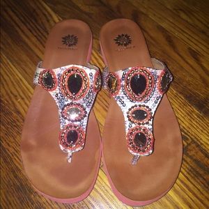 Yellow box embezzled flip flops