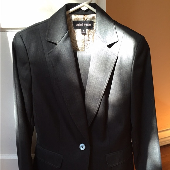 Fashionable navy/grey woman's pant suit.