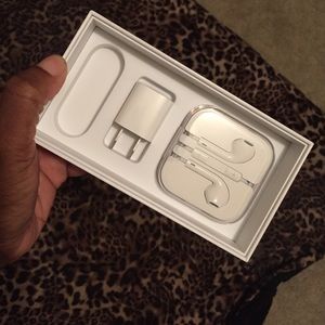 Authentic Apple head phones and base charger