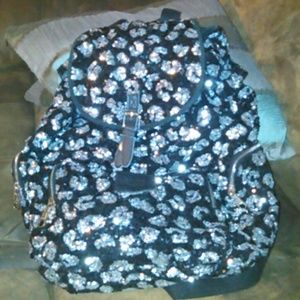 Backpack VS sequin bag