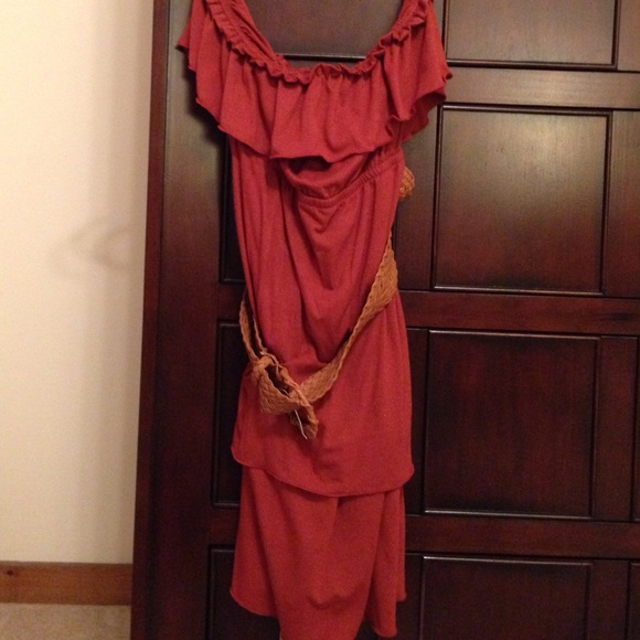 Rust orange strapless dress with a belt