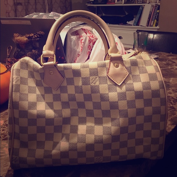Tan and white checkered purse