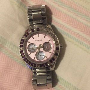 Silver Fossil watch with purple face