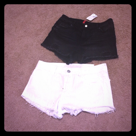 Black shorts and white shorts white has sequins