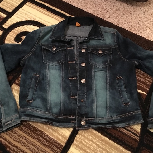 Distressed blue jean jacket