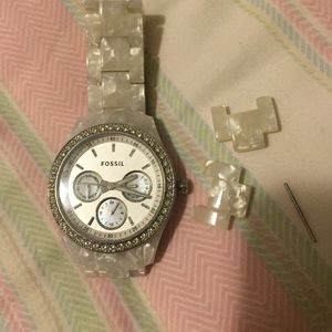 White and Silver Fossil watch